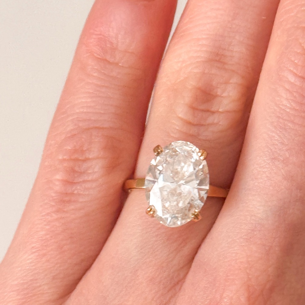 5.28 cw oval lab diamond engagement ring set in gold with hidden halo